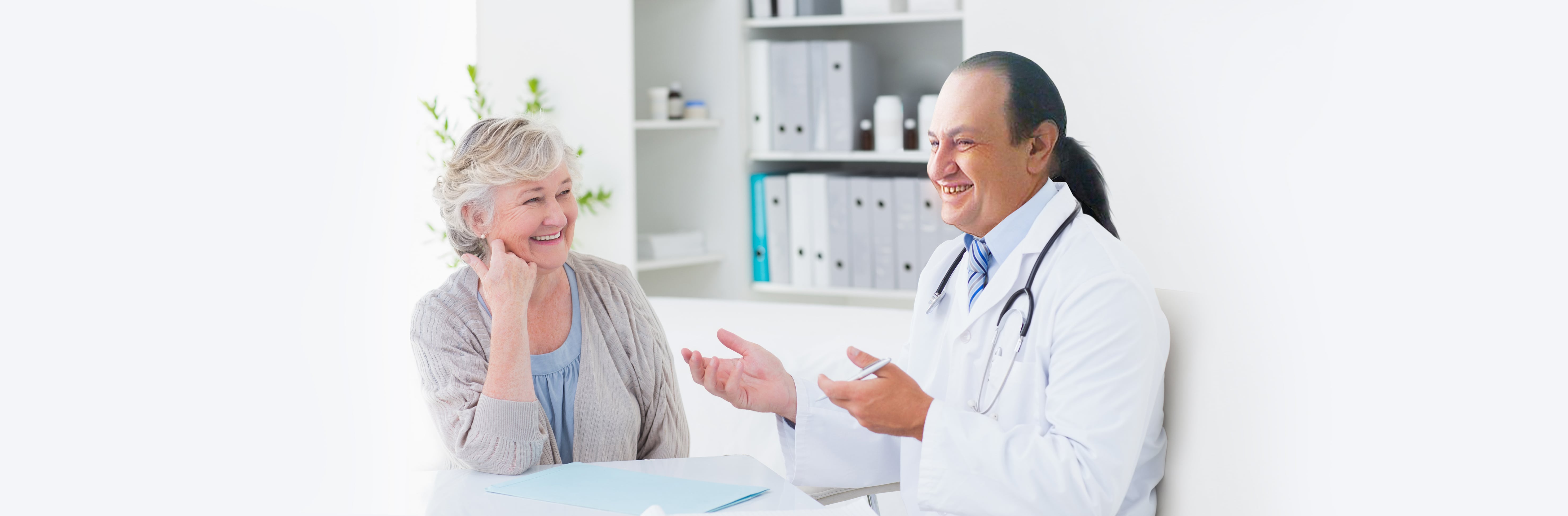 Dr. Burshteyn speaking with a patient